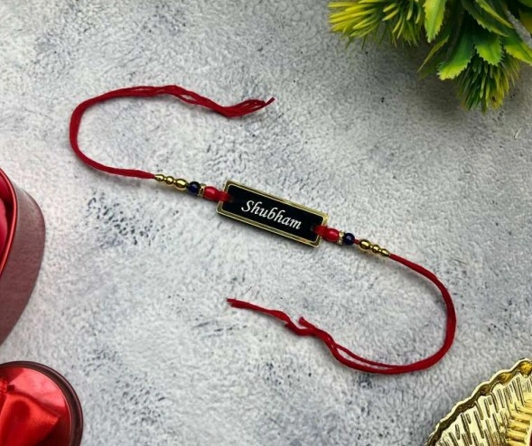 37416c19-9eb3-4f6e-907f-283f3fd9fef7 personalized thread rakhi, personalized name rakhi, custom name rakhi, engraved name rakhi, name plate rakhi, custom thread rakhi, rakhi for brother, personalized rakhi for brother