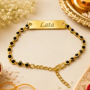 bracelet rakhi, personalized bracelet rakhi, customized bracelet rakhi, black bead bracelet rakhi, personalized black bead bracelet, custom bracelet rakhi, name engraved bracelet rakhi, personalized name bracelet, custom name bracelet, engraved name bracelet, gold bracelet rakhi