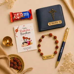 Personalized Rakhi gift hamper featuring a custom name wallet, personalized name rakhi, engraved pen, greeting card and chocolates by Banaado